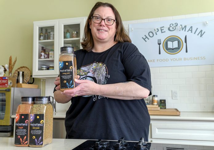 BIG BOOST: Kristin Costa runs her small business, Pinch of Fancy LLC, with the help of culinary business incubator Hope & Main in Warren, but she started in her own kitchen and was helped by Rhode Island relaxing laws against homemade food businesses in 2022.  PBN PHOTO/ MICHAEL SALERNO