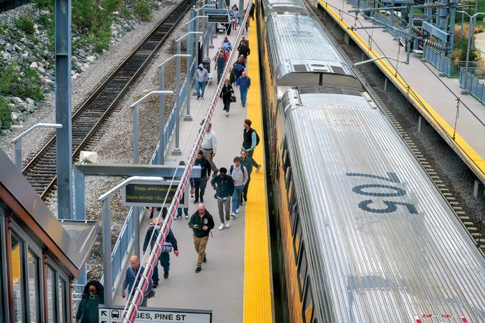 HOMEWARD BOUND: Passengers disembark from a commuter train at the Pawtucket-Central Falls station on a recent weekday afternoon. The train arrived from Boston.  PBN PHOTO/MICHAEL SALERNO