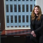 OPENING DOORS: Among her roles at Webster Bank N.A., Kimberly Peckham serves as a mentor through the bank’s credit rotational program to introduce young bankers to a variety of financial opportunities.  PBN PHOTO/PAUL J. SPETRINI