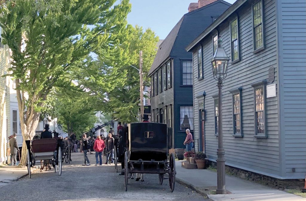 PRIME VIEWING: Residents look on as a production crew works on Clarke Street in Newport during the filming of the HBO series “The Gilded Age” in May 2021.
PBN PHOTO/ANNE EWING