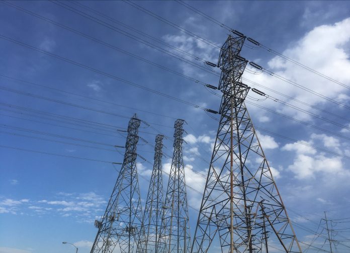 A NEW LEGISLATIVE COMMISSION is starting the process of examining the cost-effectiveness of Rhode Island's clean energy programs. / AP FILE PHOTO/JOHN ANTCZAK