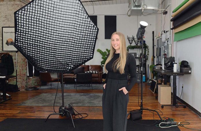 ART WORK: From 2022 to 2024, Tric Agency Co. founder and Chief Marketing Officer Mckenzie Kapsimalis crafted all social media content leading up to and through Providence’s annual PVDFest.  PBN PHOTO/TRACY JENKINS