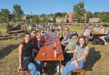 Building Enclosure Science LLC GARDEN PARTY: Building Enclosure Science LLC employees enjoy some drinks at a local beer garden.
COURTESY BUILDING ENCLOSURE SCIENCE LLC