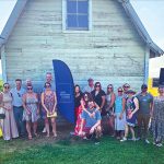 THROUGH THE GRAPEVINES: Employees from Carey, Richmond & Viking Insurance gather for a summer outing at Westport Vineyards.  COURTESY CAREY, RICHMOND & VIKING INSURANCE