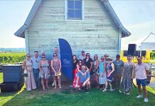 Carey Richmond & Viking Insurance THROUGH THE GRAPEVINES: Employees from Carey, Richmond & Viking Insurance gather for a summer outing at Westport Vineyards.
COURTESY CAREY, RICHMOND & VIKING INSURANCE