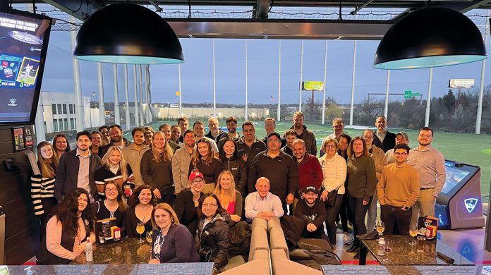 FORE!: CBIZ Inc. employees gather for an outing at TopGolf Rhode Island in Cranston.  COURTESY CBIZ INC.