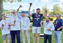 Centreville Bank GOING FOR GOLD: Centreville Bank staffers participate in the company’s 2024 Olympic-themed block party. Winners take to the award podium to cheer and accept their medals.
COURTESY CENTREVILLE BANK