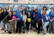 FAST LANE: Coastal1 Credit Union employees gather for a day of bowling at East Providence Lanes.  COURTESY COASTAL1 CREDIT UNION