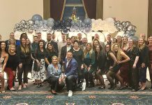 EXTRAVAGANT EVENING: DarrowEverett LLP celebrates the past year at the company’s holiday party at the Graduate by Hilton Providence.  COURTESY DARROWEVERETT LLP