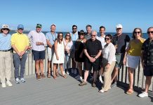 Duffy & Sweeney Ltd. SOAKING IN THE SUN: Duffy & Sweeney Ltd. employees enjoy a day out during the firm’s annual end-of-summer beach party.
COURTESY DUFFY & SWEENEY LTD.