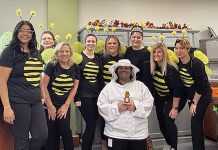 Greenwood Credit Union CREATING BUZZ: Greenwood Credit Union employeesdress up as bees at a recent company Halloween celebration.
COURTESY GREENWOOD CREDIT UNION