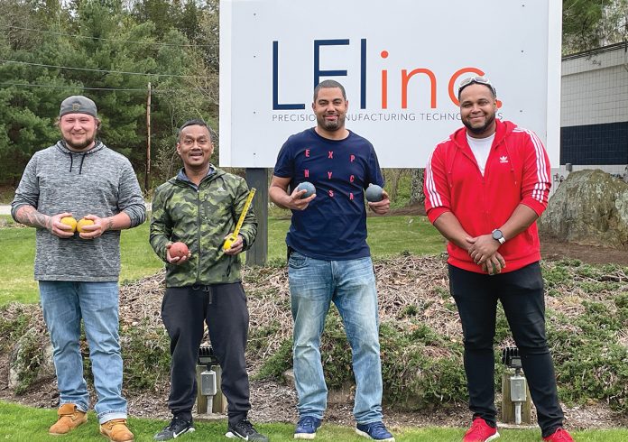 BALLING OUT: LFI Inc. employees get ready to participate in a game of bocce.
COURTESY LFI INC. BALLING OUT: LFI Inc. employees get ready to participate in a game of bocce.
COURTESY LFI INC.