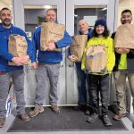 IN THE BAG: Lockheed Architectural Solutions Inc. holds bags of groceries and supplies for those in need.  COURTESY LOCKHEED ARCHITECTURAL SOLUTIONS INC.