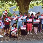 Marasco & Nesselbush LLP FLAG DAY: Marasco & Nesselbush LLP employees hold up U.S. flag paintings they made during an employee-led paint day.
COURTESY MARASCO & NESSELBUSH LLP