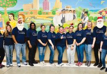 Narragansett Bay Insurance Co. SPREADING GOODWILL: Employees from Narragansett Bay Insurance Co. volunteer at a local school during the holiday season.
COURTESY NARRAGANSETT BAY INSURANCE CO.