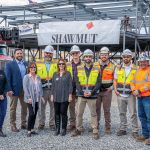 Shawmut Design and Construction REACHING THE TOP: Shawmut Design and Construction employees celebrate a topping off at Elizabeth Baldwin Elementary School in Pawtucket.
COURTESY SHAWMUT DESIGN AND CONSTRUCTION