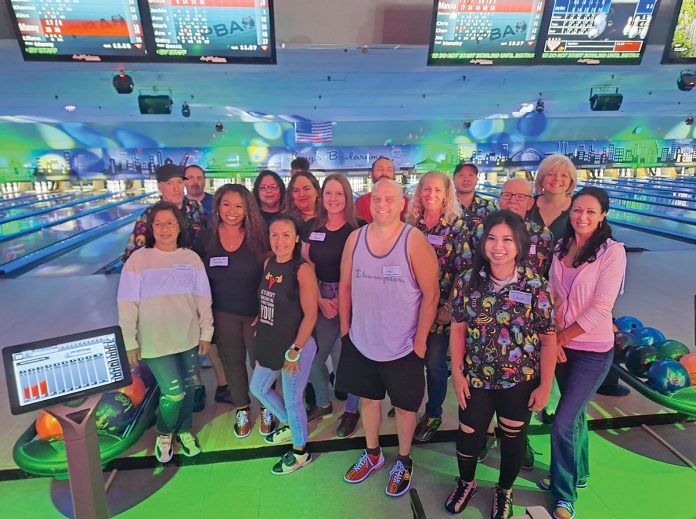 STRIKES AND SPARES: Swarovski Optik North America Ltd. employees spend an evening on the lanes at Lang’s Bowlarama Inc. in Cranston.
COURTESY SWAROVSKI OPTIK NORTH AMERICA LTD. STRIKES AND SPARES: Swarovski Optik North America Ltd. employees spend an evening on the lanes at Lang’s Bowlarama Inc. in Cranston.
COURTESY SWAROVSKI OPTIK NORTH AMERICA LTD.