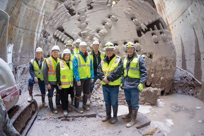 BIG DIG: Narragansett Bay Commission staffers stand beside boring equipment in a combined sewer overflow underground tunnel.
COURTESY NARRAGANSETT BAY COMMISSION BIG DIG: Narragansett Bay Commission staffers stand beside boring equipment in a combined sewer overflow underground tunnel.
COURTESY NARRAGANSETT BAY COMMISSION