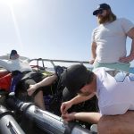 ON THE WATER: Vatn Systems Inc. employees relaxing on a boat.  COURTESY VATN SYSTEMS INC.