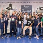 GAME TIME: Yushin America Inc. employees wear sports apparel during the company’s Spirit Day event.  COURTESY YUSHIN AMERICA INC.