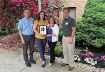 The Providence Mutual Fire Insurance Co. BEING THE BEST: Employees from The Providence Mutual Fire Insurance Co. celebrate after receiving their Best Places to Work award from Providence Business News last year.
COURTESY THE PROVIDENCE MUTUAL FIRE INSURANCE CO.