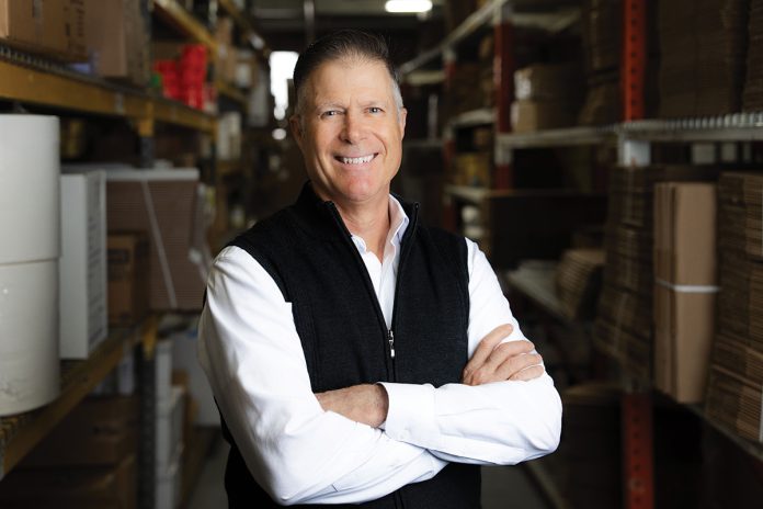 David Spencer and his wife, Lisa, acquired Pawtucket-based Atlantic Paper & Supply Co. in 1992 from Lisa’s father, Jack McDermott. Spencer started working for the company in 1986, following several years in the advertising business. Atlantic is the 2025 U.S. Small Business Administration Rhode Island family-owned small business of the year. / COURTESY ATLANTIC PAPER & SUPPLY CO.