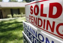 THE MEDIAN price of single-family homes sold in Bristol County, Mass., increased to $519,000 in May, a 1.8% jump from the same month the previous year, according to The Warren Group. / AP FILE PHOTO/ROGELIO V. SOLIS