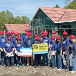 HOME IMPROVEMENT: The Washington Trust Co. employees help construct a house as part of a project by South County Habitat For Humanity.  COURTESY THE WASHINGTON TRUST CO.