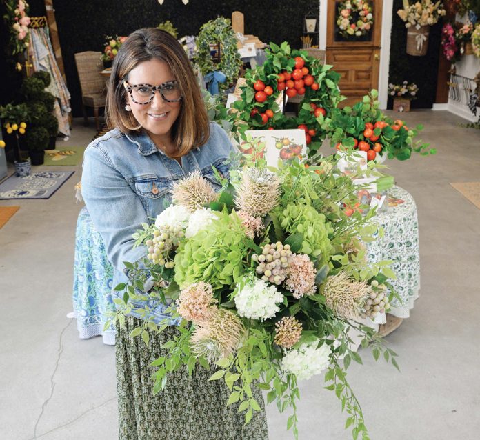 FLORAL SHOP: Jessica Billings has sold artificial floral arrangements through her online store The Accidental Farmer Co. for years. In May, she opened her first brick-and-mortar store called Farmgirl’s Front Porch in North Kingstown.  PBN PHOTO/ELIZABETH GRAHAM