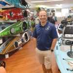 LEVELING UP: Matt Bosgraaf, who began working at The Kayak Centre in North Kingstown nearly 25 years ago as a high school student providing basic waterside assistance and customer service tasks, was recently named a co-owner of the business, which features instruction, rentals and sales, alongside founder Jeff Shapiro. PBN PHOTO/ELIZABETH GRAHAM
