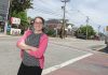READY TO HELP: Jillian Finkle, deputy director for Grow Smart Rhode Island, will be helping to oversee a three-year pilot program focused on revitalizing the state’s Main Streets, such as the commercial corridor along Dexter Street in Central Falls, where Finkle is pictured.  PBN PHOTO/MICHAEL SALERNO