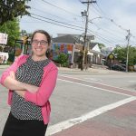 READY TO HELP: Jillian Finkle, deputy director for Grow Smart Rhode Island, will be helping to oversee a three-year pilot program focused on revitalizing the state’s Main Streets, such as the commercial corridor along Dexter Street in Central Falls, where Finkle is pictured.  PBN PHOTO/MICHAEL SALERNO