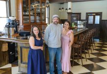 NEW MARKET: Lydia Emmons, left, managing partner, is joined by co-owners Daniel and Charle Hornby at Sawyer’s Market on Broadway in Providence, which opened in June. PBN PHOTO/MICHAEL SALERNO