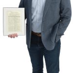 the prop Jason Cabral holds a prop from the first live off-Broadway preview performance of “Hamilton” held at The Public Theater in New York.