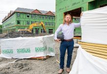UNDER CONSTRUCTION: Taction Properties principal developer Derek Mesolella visits the site of a mixed-use development on West Main Road in Middletown that has been in the works for more than five years, but he hopes that recently approved legislation modifying the state building code will help to reduce the red tape associated with housing production in Rhode Island.  PBN PHOTO/DAVID HANSEN