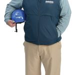 the prop Sean Lamontagne holds his Pariseault Builders Inc. construction hard hat.