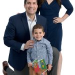 the prop Daniel Lima poses with his wife, Julianne, and their son, Benjamin, 3, as well as with a soccer ball and the Portuguese, Brazilian and U.S. flags.