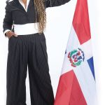 the prop Kenia McCarthy holds a Dominican Republic flag. “It showcases my culture in the hope of inspiring other immigrants like me to strive for excellence within their communities,” she said.