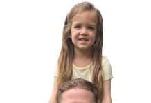 the prop John Moran poses with his daughter, Avery, 4.