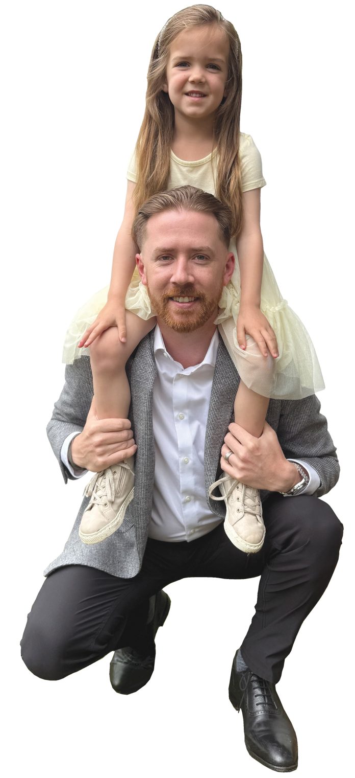 the prop John Moran poses with his daughter, Avery, 4.