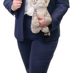 Lindy Nash the prop Lindy Nash holds a gavel and her son’s favorite stuffed animal, “Snow Leopard.”