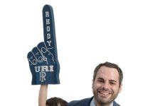 the prop John Olerio poses with his son, Anthony, 5, and daughter, Lianna, 2, both of whom are holding University of Rhode Island apparel.