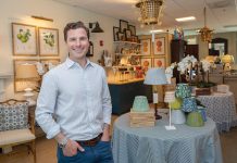 ILLUMINATING DISPLAY: Patrick Dolat managed Newport Lamp & Shade Co. for years and served as creative director before taking over as the owner in 2017. The store features high-end lamps and shades crafted by artisans from around the world.  PBN PHOTO/KATE WHITNEY LUCEY