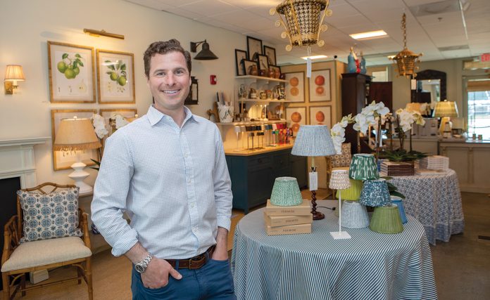 ILLUMINATING DISPLAY: Patrick Dolat managed Newport Lamp & Shade Co. for years and served as creative director before taking over as the owner in 2017. The store features high-end lamps and shades crafted by artisans from around the world.  PBN PHOTO/KATE WHITNEY LUCEY
