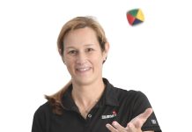 the prop Ashley Shawyer holds a set of juggling balls,  representing many tasks she constantly keeps in the air, both  personally and professionally.