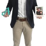 M. Evan Sherer the prop M. Evan Sherer holds the Amica “A” and a family photo.