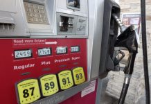 THE AVERAGE weekly price of self-serve, regular unleaded gasoline in Rhode Island decreased 4 cents to $3.02 per gallon. That price is 12 cents lower than the national average and 45 cents less than it was a year ago, AAA Northeast says. / AP FILE PHOTO/NAM Y. HUH