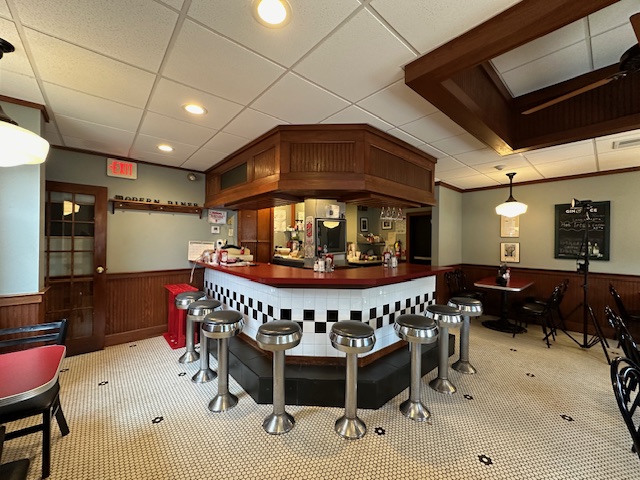 image0 AFTER MORE than four decades of service, the Demou family is retiring and selling the Modern Diner at 364 East Ave. for $979,000. This is an interior photo of the dining area attached to the original Sterling Streamliner. / COURTESY COMMUNICATION WORKS INC.