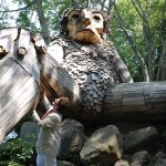 TROLL TRAIL: Louise Bishop, South County Tourism Council CEO and president, on Rhode Island’s recently expanded “troll trail,” in Charlestown. The state now has five trolls, which are made from recycled materials and attract thousands of visitors. PBN FILE PHOTO/­ELIZABETH GRAHAM 