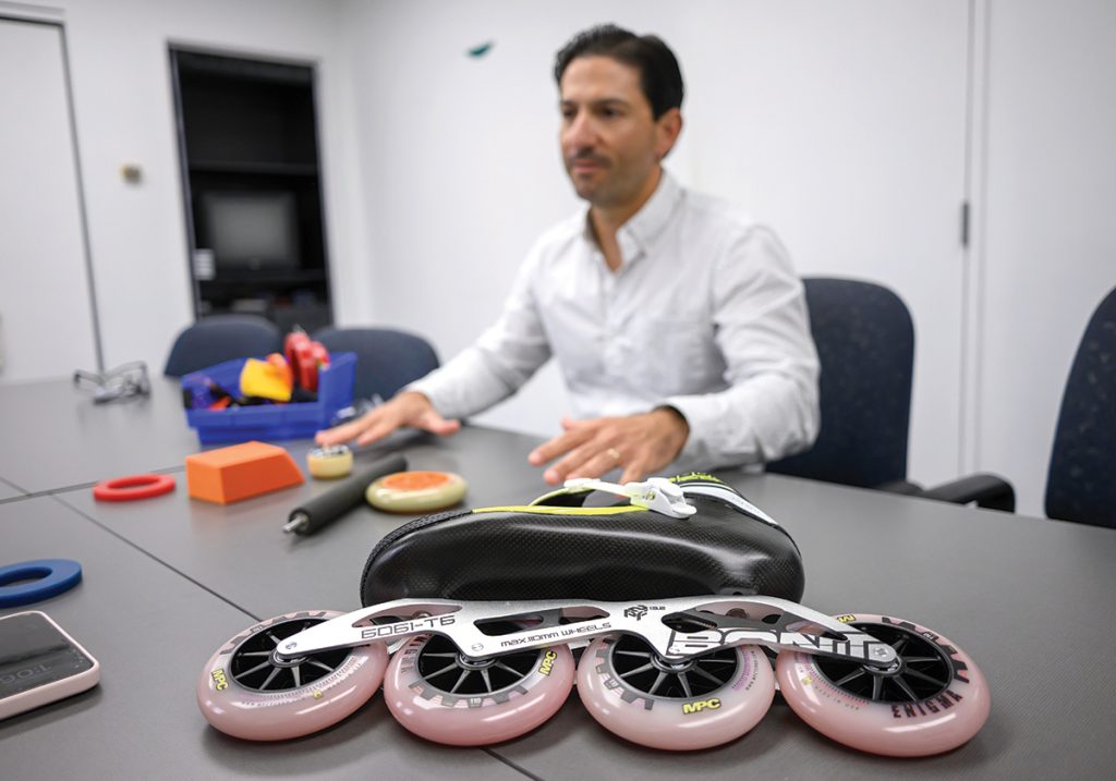 RIDING HIGH: Mearthane Products Corp. in Cranston produces precision polyurethane products, including about 500,000 inline skate wheels annually, according to Alejandro Martinez, the company’s marketing director. PBN PHOTO/MICHAEL SALERNO